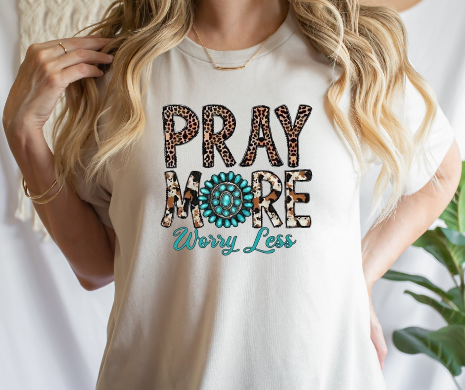 Product details Custom sublimated tee that reads "Pray More Worry Less T Shirt" Pressed on a Lucky & Blessed Tee Short sleeve  Fits true to size Contact us about a custom color shirt.   *Colors may vary slightly due to monitor resolution and lighting* Southern Bliss Boutique