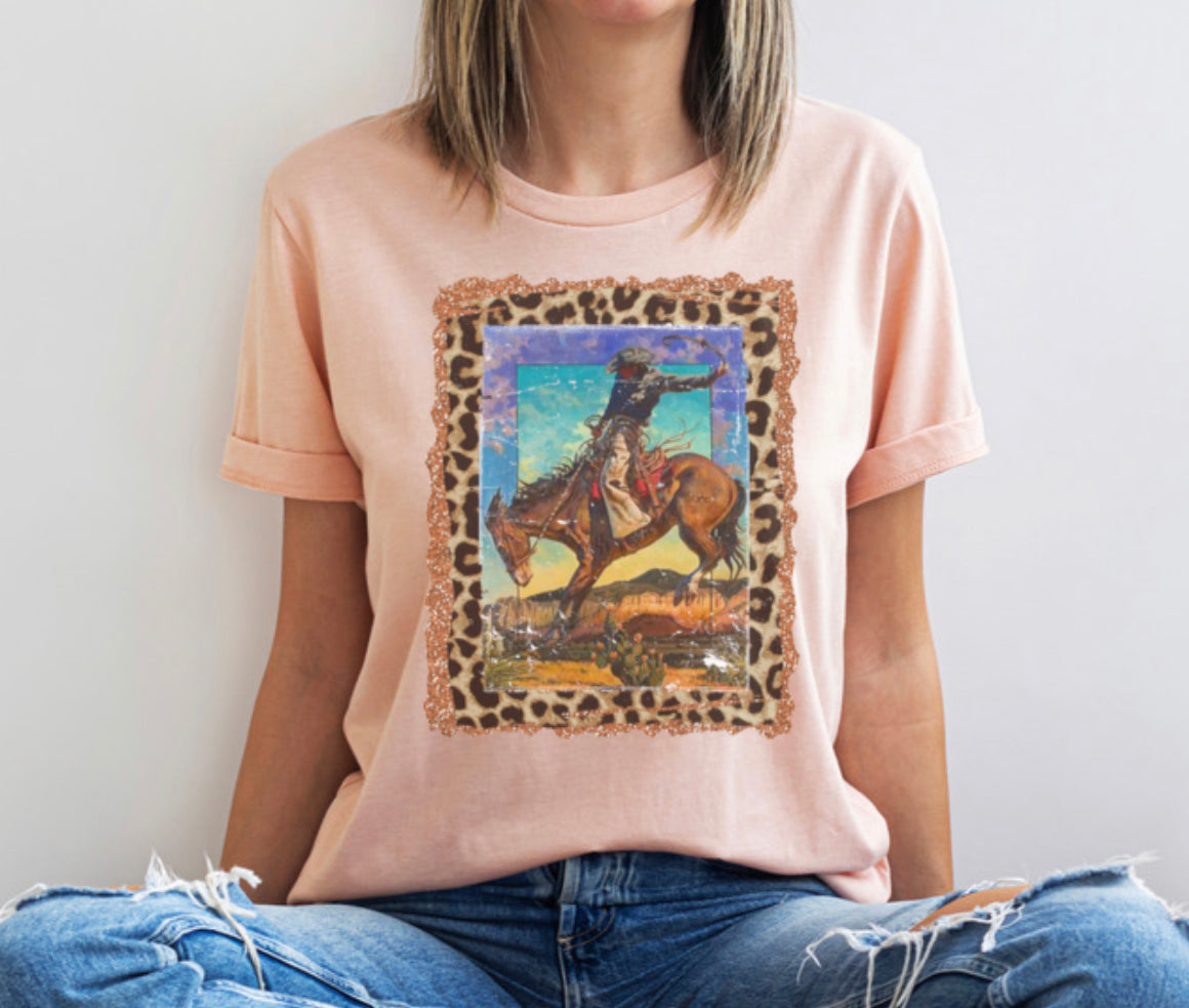 Product details  Custom sublimated tee with a bucking bronco  Pressed on a Bella Canva shirt Short sleeve  Fits true to size Contact us about a custom color shirt.   *Colors may vary slightly due to monitor resolution and lighting* Southern Bliss Boutique