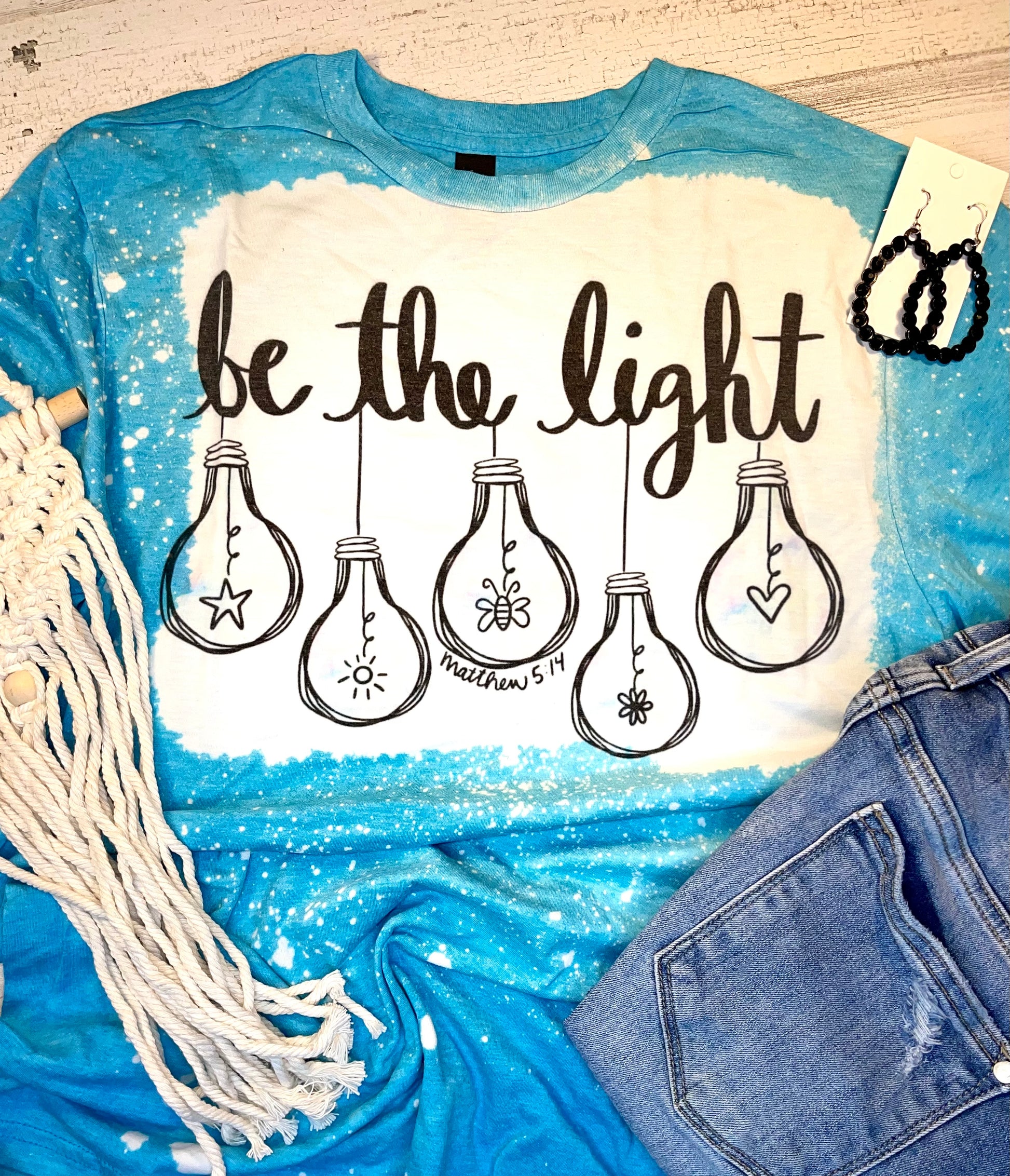 Product details  Custom sublimated tee that reads “ be the light" Pressed on a sift style gildan shirt Short sleeve  Fits true to size Contact us about a custom color shirt. 