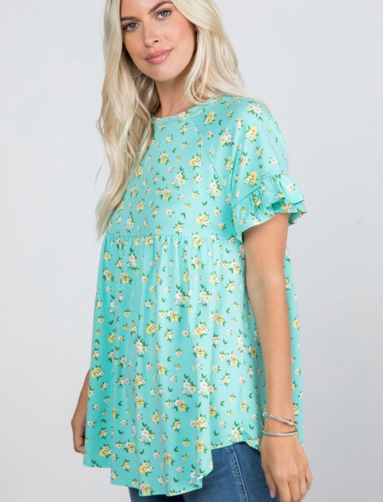 Product details Floral Printed  Ruffled sleeves Round neckline Baby doll style straight hem at bottom Fits true to size  *Colors may vary slightly due to monitor resolution and lighting* Southern Bliss Boutique 