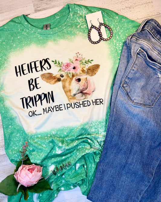 Product details  Custom sublimated tee that reads “Heifer Be Trippin okay maybe I pushed her" Pressed on a soft style Gildan shirt Short sleeve  Fits true to size Contact us about a custom color shirt.   *Colors may vary slightly due to monitor resolution and lighting* Southern Bliss Boutique