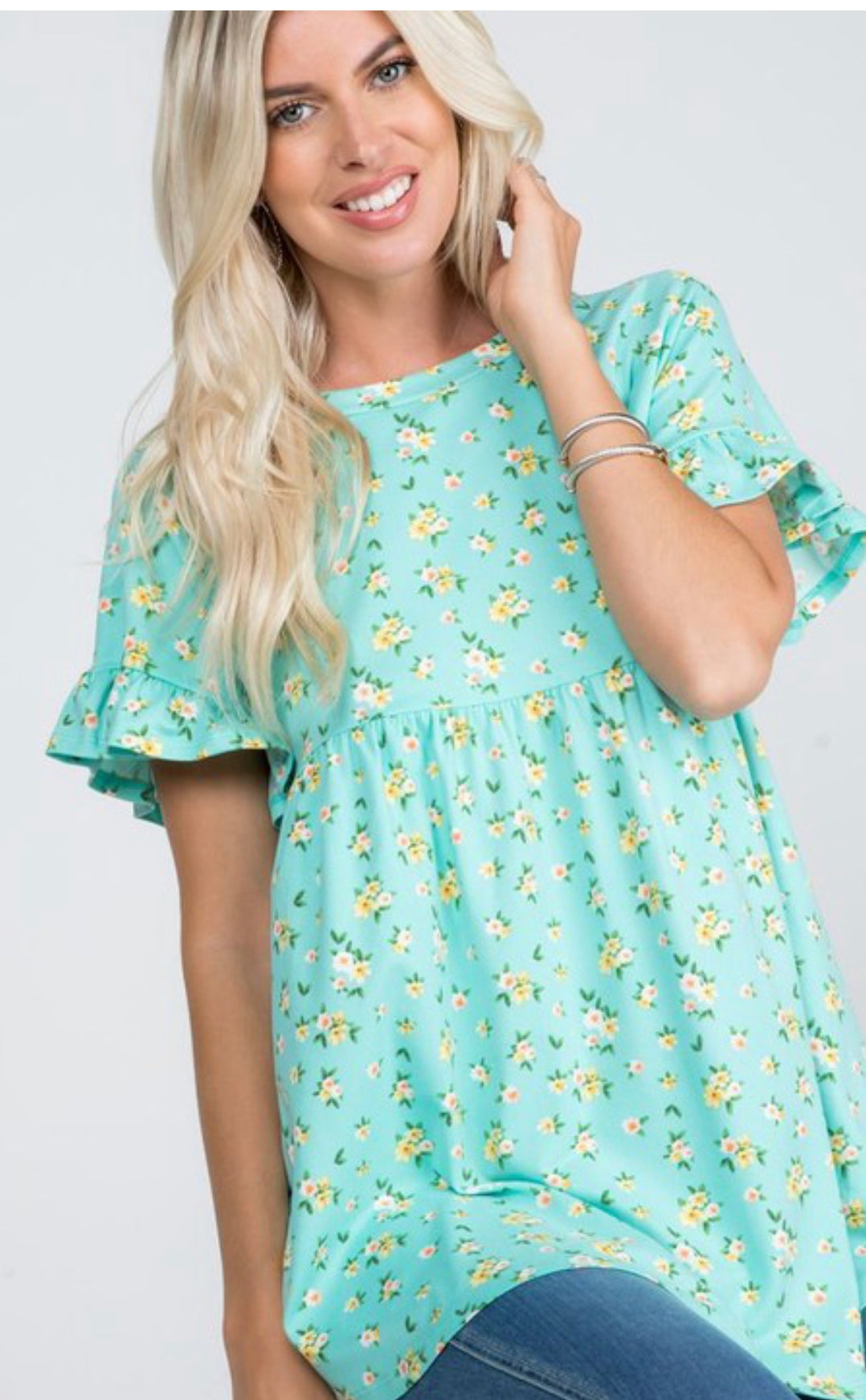 Product details Floral Printed  Ruffled sleeves Round neckline Baby doll style straight hem at bottom Fits true to size  *Colors may vary slightly due to monitor resolution and lighting* Southern Bliss Boutique