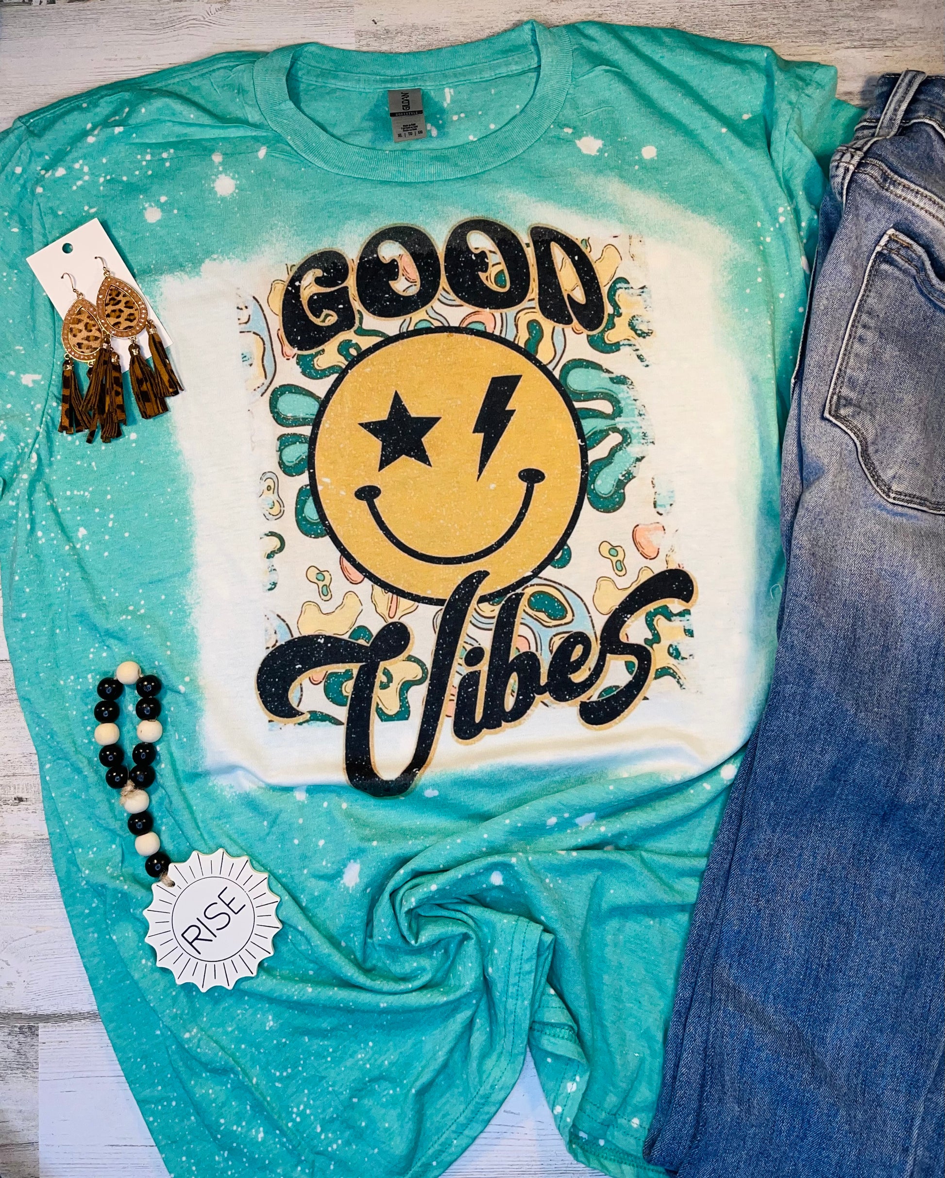 Product details  Custom sublimated tee that reads “Good vibes" Pressed on a soft style gildan shirt Short sleeve  Fits true to size Contact us about a custom color shirt.   *Colors may vary slightly due to monitor resolution and lighting* Southern Bliss Boutique