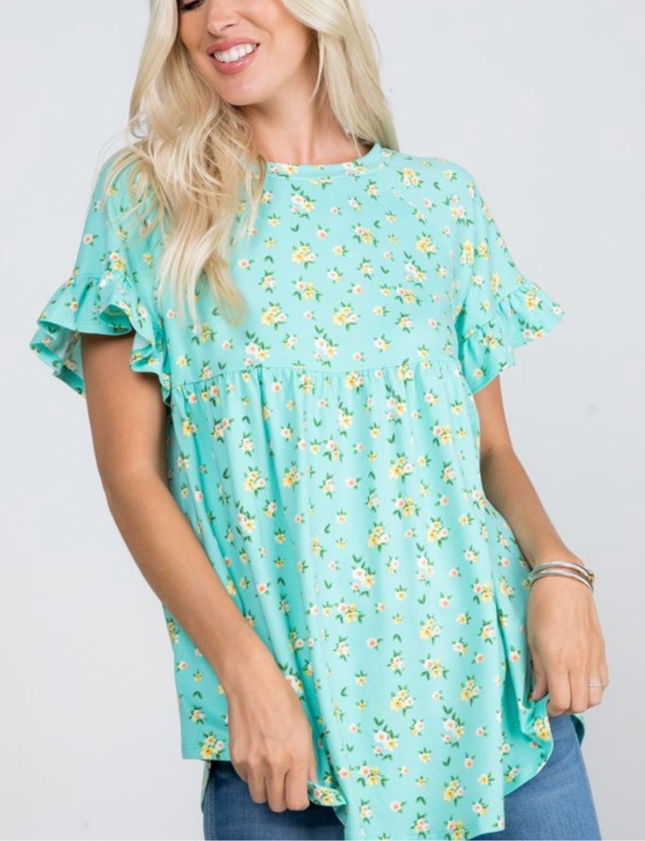 Product details Floral Printed  Ruffled sleeves Round neckline Baby doll style straight hem at bottom Fits true to size  *Colors may vary slightly due to monitor resolution and lighting* Southern Bliss Boutique