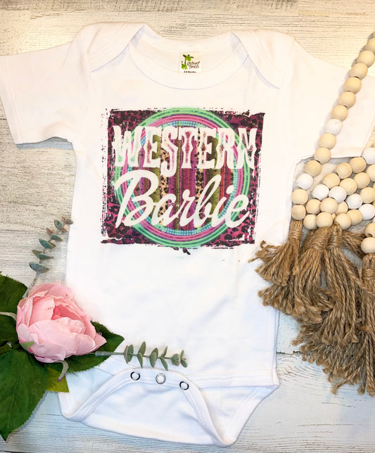 Product details  Custom sublimated  onesie that reads "Western Barbie" Pressed on a Laughing Giraffe Short sleeve  Fits true to size Contact us about a custom color shirt.   *Colors may vary slightly due to monitor resolution and lighting* Southern Bliss Boutique